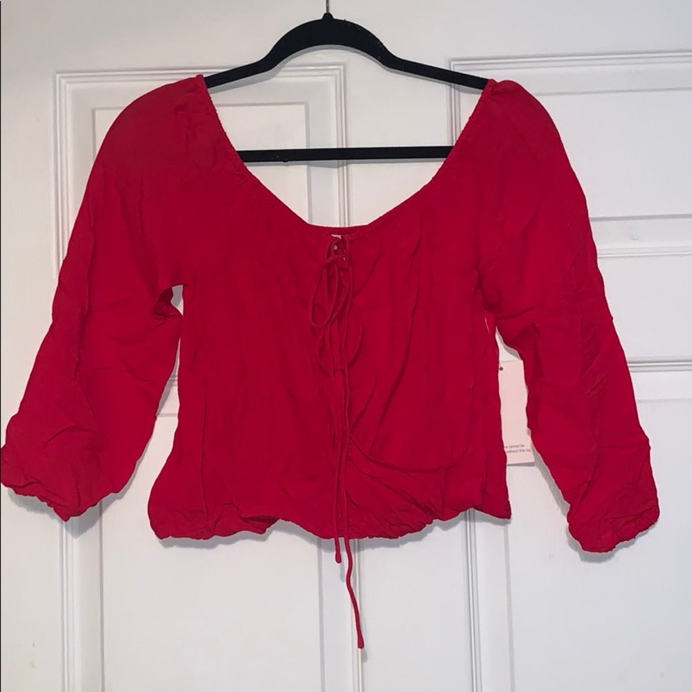 Blood red off the shoulder cris cross